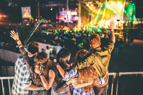Teens from back cheering on their favorite band teens from back cheering on their favorite band