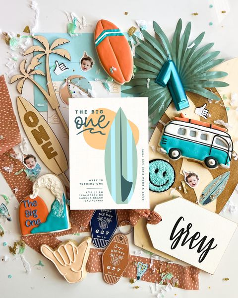 A surf themed first birthday party has tons of surf details including cookies in the shape of a VW bus or surf board and things that say t he big one a surf themed first birthday party has tons of surf details including cookies in the shape of a vw bus or surf board and things that say t he big one