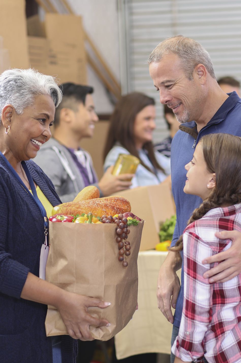 fall activities volunteers working at food bank